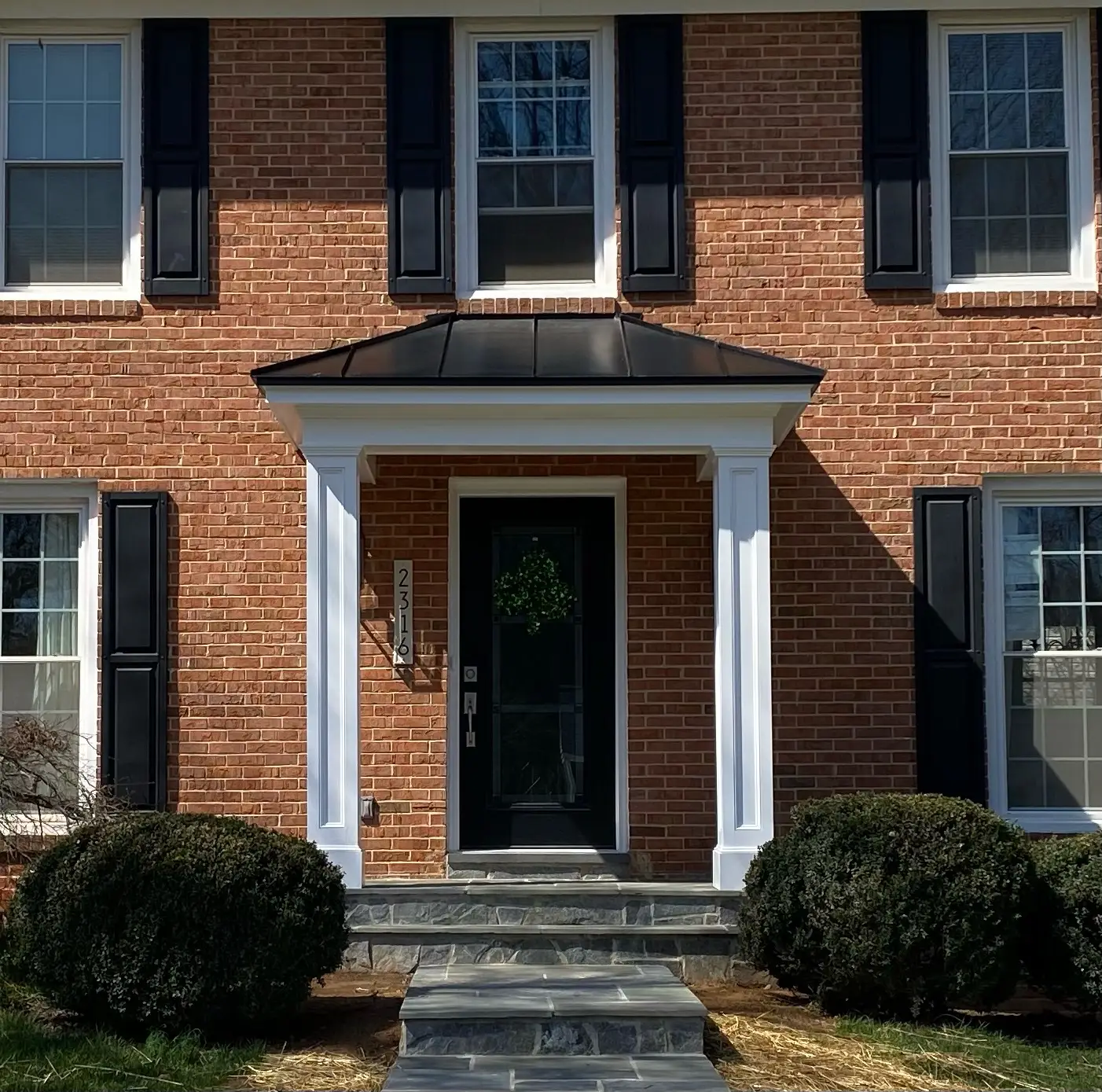 Photo of a portico installed by CIR Exteriors Porticos and Porches service